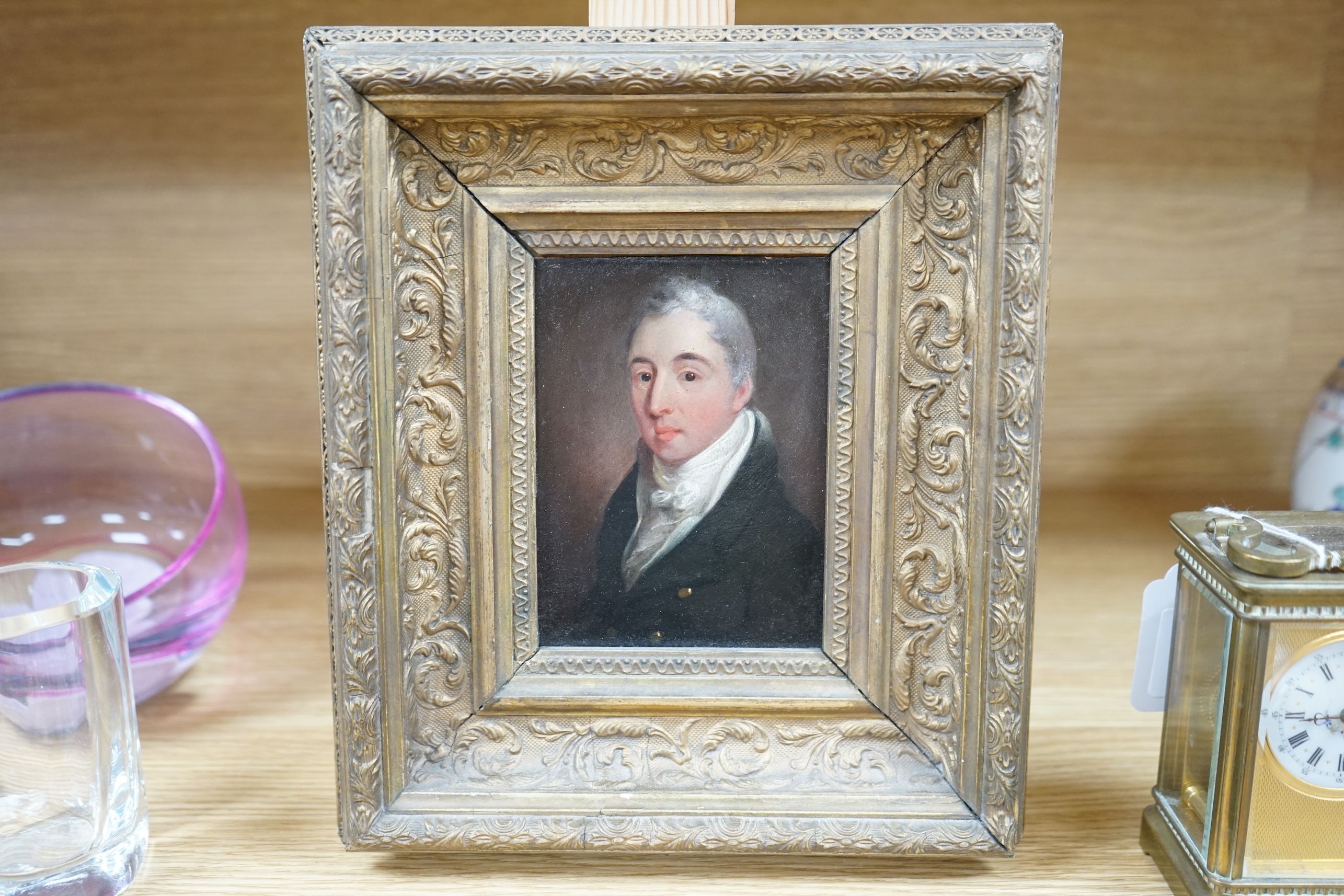 19th century School, oil on board, Portrait of a gentleman wearing a white stock, 9cm x 12.5cm, ornate gilt framed. Condition - fair to good